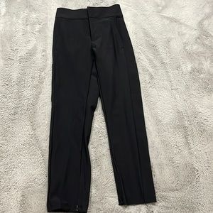 Straight legged pants with zippers at bottom. Perfect condition only worn twice